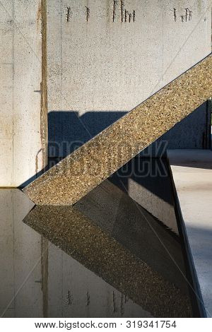 Waterloopbos, The Netherlands, August 25, 2019: The Concrete National Monument, Reflecting In The Su