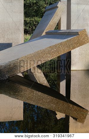 Waterloopbos, The Netherlands, August 25, 2019: The Concrete National Monument, Reflecting In The Su