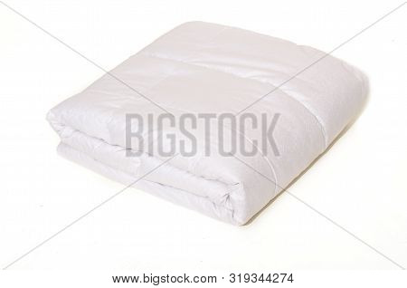 Rolled White Duvet Cover On Isolated Background