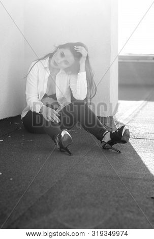 Young Sexy Woman Posing In The Roof, Wearing Leater Jacket, Swag Floral Hat Mirrored Sunglasses And 