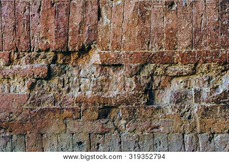 The Ancient Brick Wall Was Neatly Arranged And So Strong That There Was No Space, Even A Small Needl