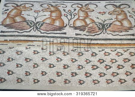 A Ancient Ottoman Mosaic With Birds And Gazelles