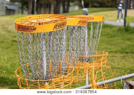 Umea, Sweden - August 14, 2019: Several Frisbee Golf Goal Stands Waiting For Deployment In Forest Ar
