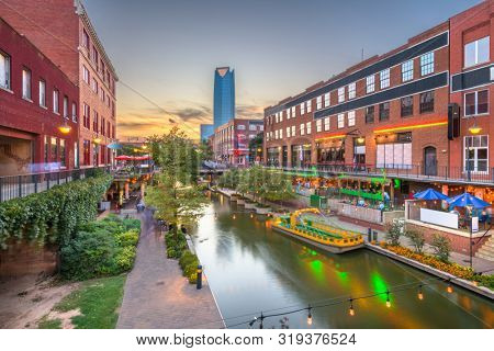 Oklahoma City, Oklahoma, USA cityscape in Bricktown at dusk.