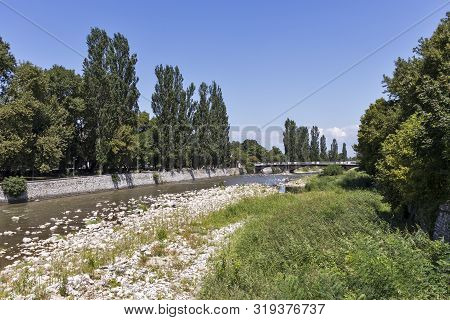 Asenovgrad, Bulgaria - August 5, 2019: Chepelarska (chaya) River Passing Through The Town Of Asenovg