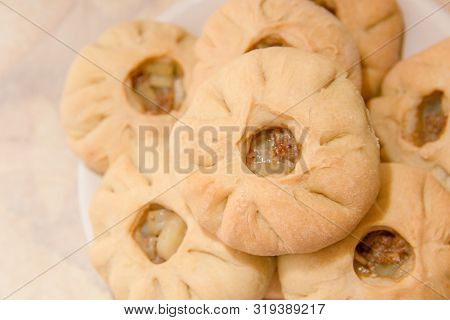 Vak Belyash - Bashkir National Cuisine, Homemade Meat Pies In White Bowl Over Wooden Background
