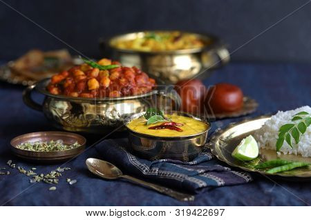 Dishes Of National Indian Cuisine On A Dark Blue Background. Traditional Indian Home-cooked Dinner. 
