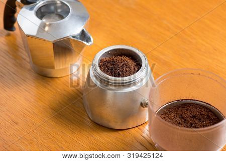 Moka Pot And Coffee Beans And Grinder.
