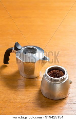 Moka Pot And Coffee Beans And Grinder.