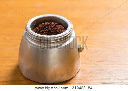 Moka Pot And Coffee Beans And Grinder.