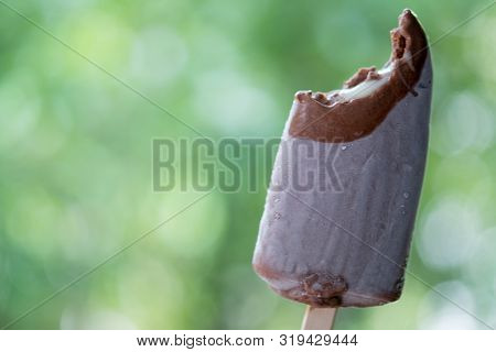 Tasty Delicious With Ice Cream Stick Chocolate Bar In Hand