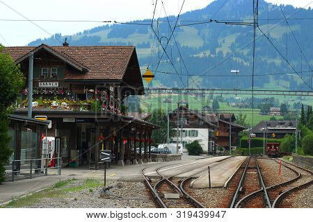 Saanen, Switzerland - July 25, 2019: The Train Station In Saanen Is A Station Managed By Railway Com