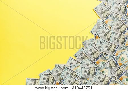 Dollar Bills A On A Light Colored Background. Copy Space, Top View Business Concept