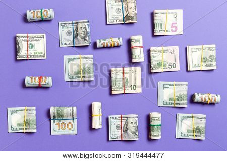 Colored Background With Money American Hundred Dollar Bills On Top Wiev With Copy Space For Your Tex
