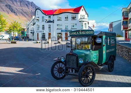 Isafjordur, Iceland - June 1, 2019: The Vintage Car Of A Bakery In The Central Square
