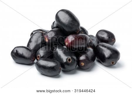 Heap of fresh Jamun berries isolated on white background