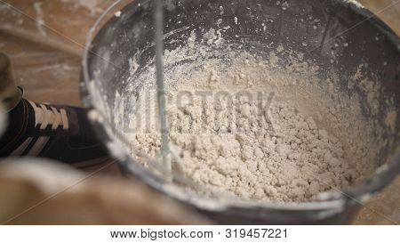 The Solution Is Mixed With A Construction Mixer. Mix The Solution In A Bucket. Manual Mixing Of Ceme
