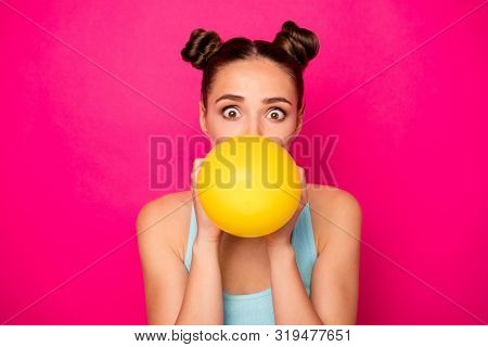 Close Up Photo Of Astonished Youth Holding Baloon Inflating Wearing Blue Singlet Isolated Over Fuchs