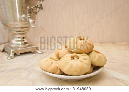 Vak Belyash - Bashkir National Cuisine, Homemade Meat Pies In White Bowl Over Wooden Background