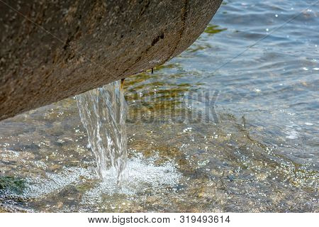 Pollution Of The Environment By Waste From Pipes Or Drainage. The Concept Of Nature Pollution Sewera