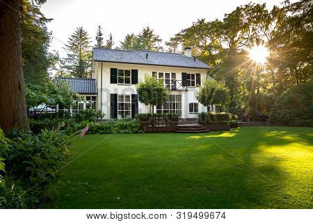 Luxury White Painted House With Archtecture Details From The Pre-war 1930s And 40s.