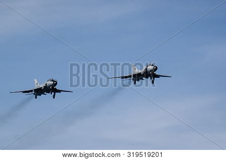 Kolobrzeg, West Pomeranian / Poland - 2019: Two Attack Aircraft Su 22 Of The Polish Air Force Perfor