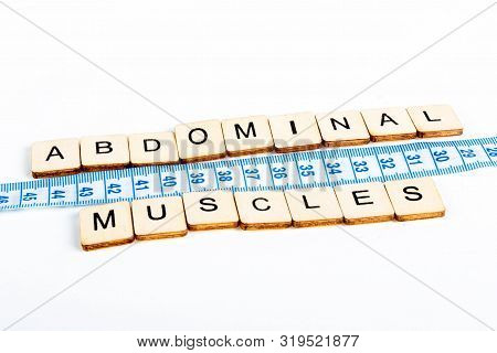 Health Concept Of A Tape Measure Also Showing The Message Abdominal Muscles