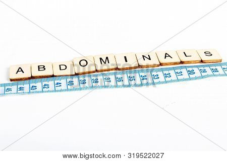 Health Concept Of A Tape Measure Also Showing The Message Abdominals