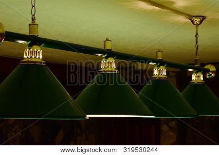 Green Billiard Lamp Close Up. Row Green Lamps Billiard For Lighting Of Table. Small Sharpness.