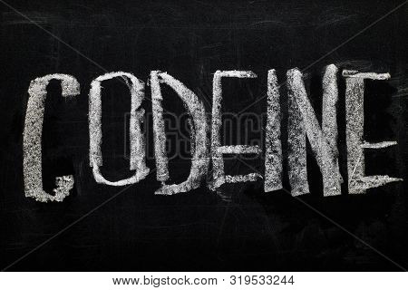 Top View Of Black Chalk Board With Lettering Codeine
