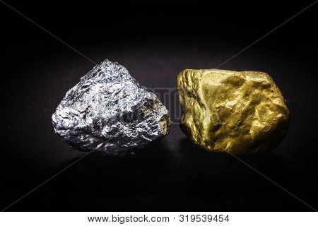 Gold And Silver Nuggets On Black Background. Precious Stones, Luxury Concept And Mineral Drainage. I