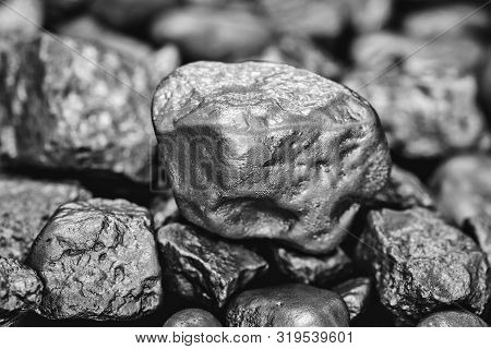 Gold And Silver Nuggets On Black Background. Precious Stones, Luxury Concept And Mineral Drainage. I