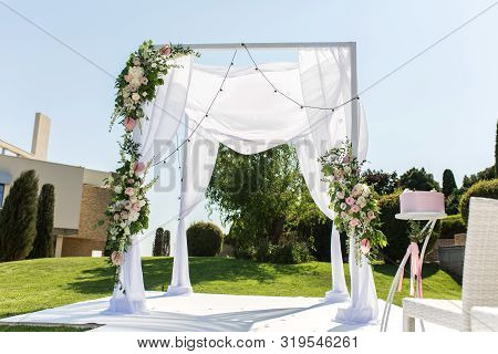 Beautiful Outgoing Wedding Set Up. Jewish Hupa On Romantic Wedding Ceremony , Wedding Outdoor On The