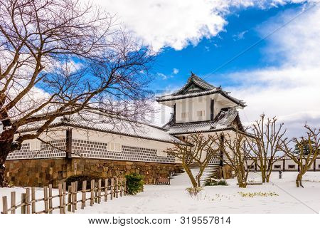 Kanazawa, Japan at the castle in winter with snow.