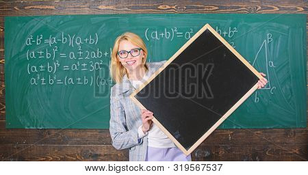 Remember This Information. Teacher Smart Smiling Woman Hold Blackboard Blank Advertisement Copy Spac