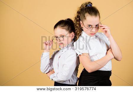 Back To School. Study Concept. Smart Small Girls At Lesson. Small Girls In School Uniform. Confident