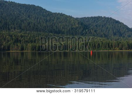 Teletskoye lake in Altai mountains, Siberia, Russia. Beauty summer morning.