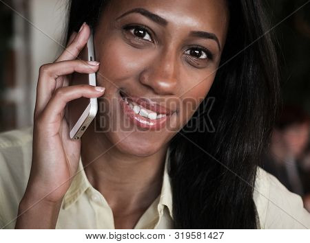 African American woman talking on a mobile phone 