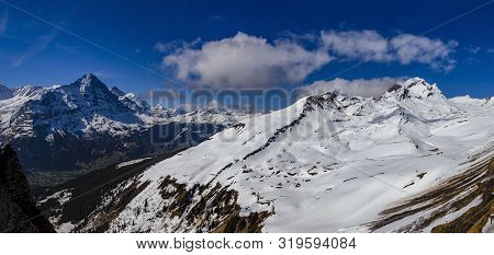 Snow On Alps Mountain At Switzerland , Looking From Sky Cliff Walk On First Peak Grindelwald