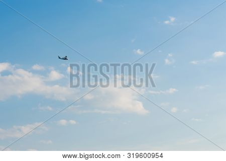 Seaplane. Flying Boat On Blue Sky.