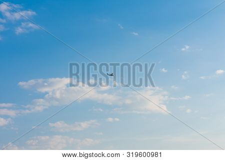 Seaplane. Flying Boat On Blue Sky.