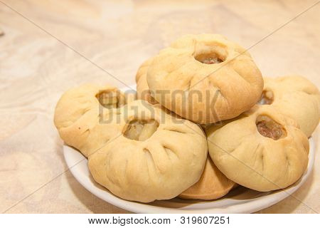 Vak Belyash - Bashkir National Cuisine, Homemade Meat Pies In White Bowl Over Wooden Background