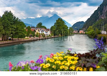 Aare River In Old City Of Interlaken, Important Tourist Center In The Bernese Highlands, Switzerland
