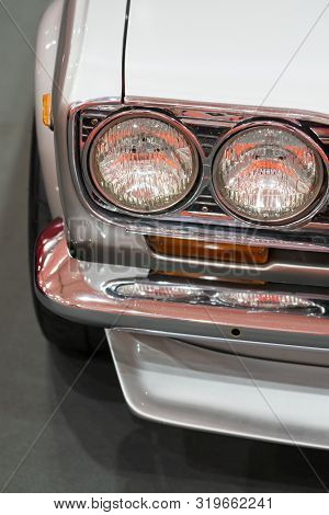Close Up Color Detail On The Headlight Of A Vintage Car