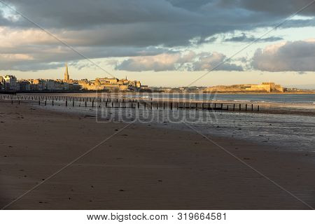 The Morning Light On The Plage Du Sillon And Walled City. Saint Malo , France, Ille Et Vilaine, Emer