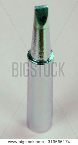 Image Of Soldering Tips On Pink Background