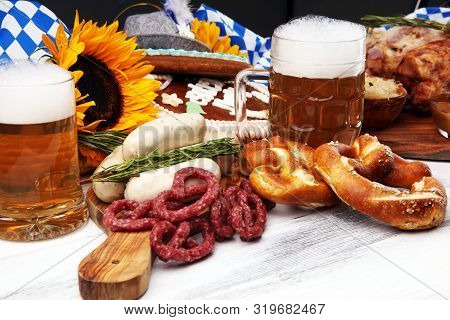 Traditional German Cuisine, Schweinshaxe Roasted Ham Hock. Beer, Pretzels And Various Bavarian Speci