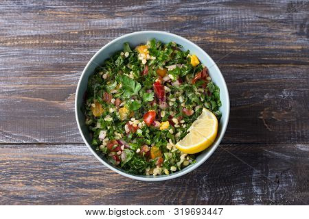 Original Oriental Salad Tabbouleh With Cabbage Cale, Parsley, Bulgur, Tomatoes And Red Onions On A W