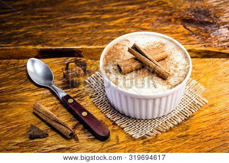 Creamy Rice Pudding Sprinkled With Cinnamon, Typical Brazilian Dessert.
