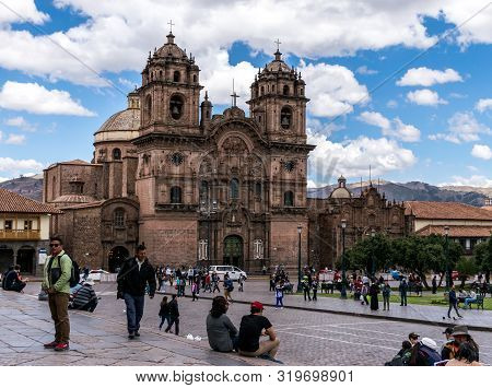 Cusco, Peru - 05/24/2019: Spanish Colonial La Compania In The Plaza De Armas In Cusco, Peru.